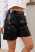 Шорты женские из экокожи с отворотами
